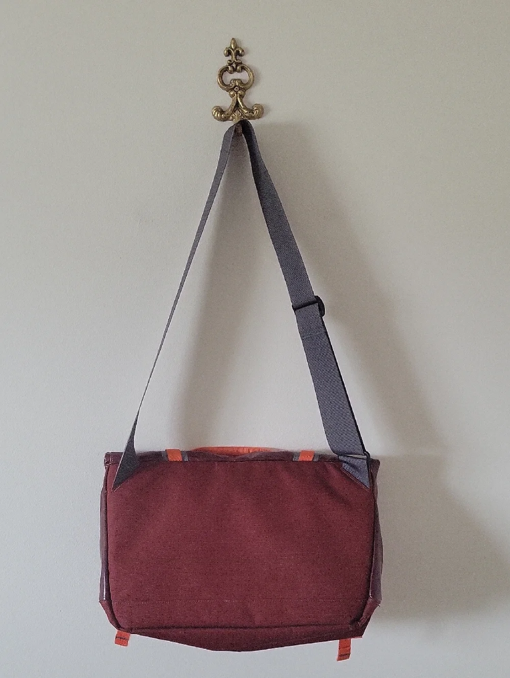 Patagonia Black Hole Mini Messenger 12L Bag Burgundy Rust with Orange Accents